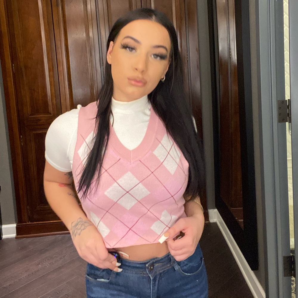 Pink sweater vest *only